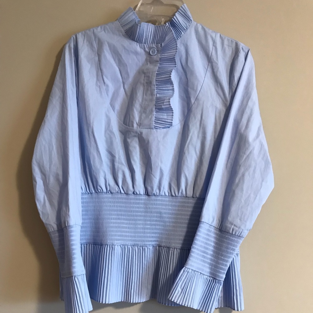 Light blue top